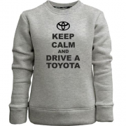Детский свитшот без начеса Keep calm and drive a Toyota