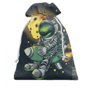 Подарунковий мішечок з астронавтом на ракеті